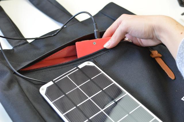 Tuck your power pack into your bag with the cable routed to your solar panel.