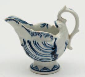 637 638 637 A Derby blue and white dolphin ewer creamboat moulded and painted with shells and foliage, circa 1770-80, 8 cm high.