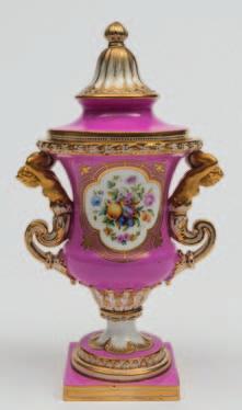 654 An English porcelain, probably Coalport, vase and cover the campana shaped body with gilt caryatid handles on a pedestal base, surmounted by a waisted and domed cover, enamelled front and verso