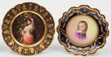 685 Two Vienna-style porcelain plates one painted with a portrait of a girl titled Sonnenblumen, on a cobalt blue and tooled gilt ground, shield mark, 24.