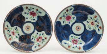 300-400 515 A Chinese famille rose porcelain charger the centre enamelled with a pair of shi shi and two brocade balls within borders
