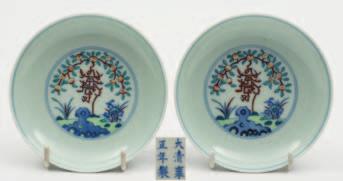 200-400 546 545 545 A set of five Chinese blue and white chargers painted with squirrels amongst bamboo, the rims carved with scrolling flowers and foliage, Qianlong, 43 cm diameter [two restored,