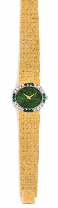 260 262 261 260 an 18 Karat Yellow Gold, Diamond, Emerald, and nephrite Jade Wristwatch, Piaget, the bezel containing 16 round brilliant cut diamonds weighing approximately 0.