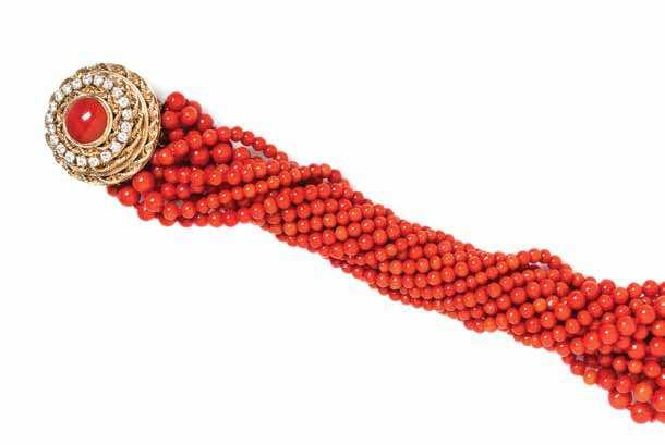 273 274 272 272 a Yellow Gold, Diamond and coral Multistrand Bracelet, consisting of a circular openwork clasp containing 21 round brilliant cut diamonds weighing approximately 2.