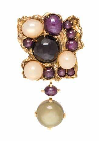 319 320 319* a Yellow Gold and Multigem Belt Enhancer/Brooch, the central plaque containing one round cabochon cut black star sapphire measuring approximately 30.