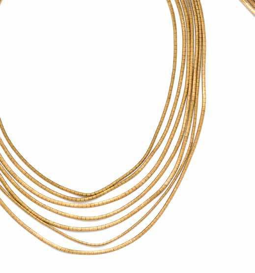 346 347 348 346* an 18 Karat Yellow Gold Demi Parure, consisting of a seven row necklace and a pair of matching four and ive row bracelets