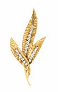 349* an 18 Karat Yellow Gold and Diamond Leaf Brooch, Gübelin, in a luted triple leaf design containing 19 round brilliant cut diamonds weighing approximately 0.83 carat total.