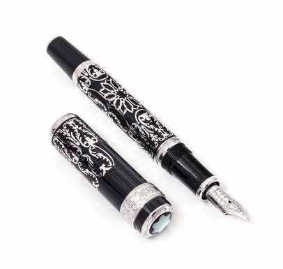 412 410 no Lot 412 a White Gold and Lacquer Limited Edition George Washington Fountain Pen, Montblanc, 411 no Lot in a black lacquer base with intricate white gold openwork, accented at the center