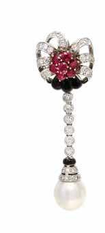493 494 492 492 an 18 Karat Bicolor Gold, Ruby, Diamond and onyx Bangle Bracelet, Ella Gem, consisting of a central domed section containing three oval rubies measuring approximately 5.00 x 4.