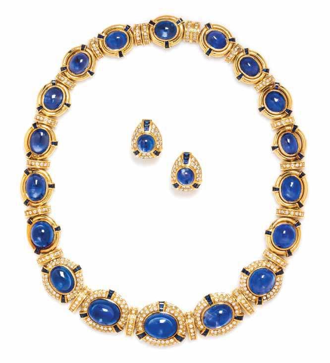 559 559* a Fine 18 Karat Yellow Gold, Sapphire and Diamond Demi Parure, consisting of a collar necklace containing 18 oval cabochon cut sapphires ranging in size from approximately 17.60 x 14.20 x 9.