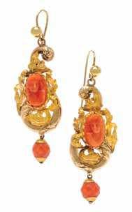 $600-800 39 a Pair of Yellow Gold and coral Pendant Earrings, containing two oval carved orange coral plaques depicting a woman s face and two round faceted coral beads set within the intricately