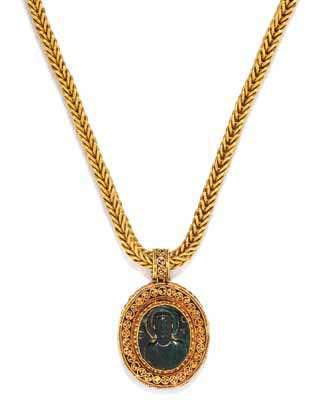 44 41 43 42 41 a High Karat Yellow Gold and Bloodstone cameo Pendant necklace, consisting of an intricate openwork pendant with granulation detail containing an oval bloodstone cameo carved in a