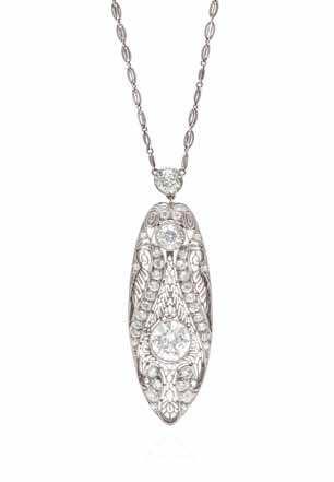 alternate view 102 104 103 102* a Fine Edwardian Platinum, Diamond and Seed Pearl necklace, consisting of a central intricate openwork pendant containing one old European cut diamond weighing