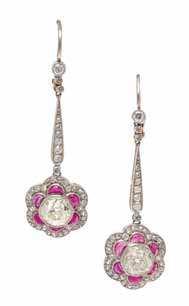 108 109 110 108 a Pair of art Deco Platinum, Diamond and Ruby Pendant Earrings, containing two old European cut diamonds weighing approximately 2.
