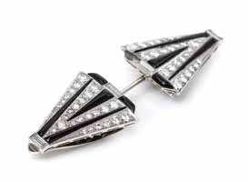 145 147 146A 146 145* an art Deco Platinum, White Gold, Diamond and onyx convertible Dress clips/jabot, consisting of two chevron motif clip brooches each containing 52 transitional brilliant cut