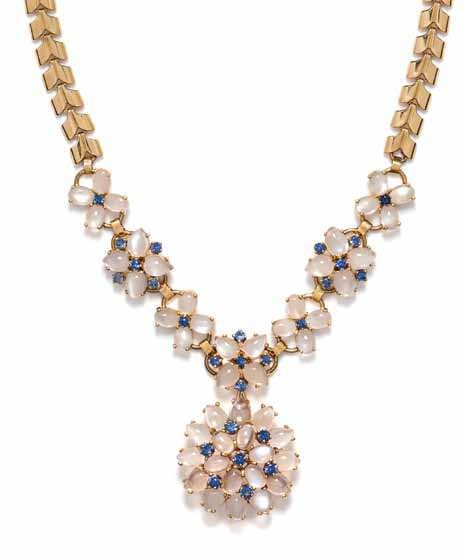 152 151 153 151 a Retro Yellow Gold, Moonstone, and Sapphire convertible necklace, Wordley, allsopp & Bliss, containing 22 oval cabochon cut moonstones measuring approximately 7.00 x 5.