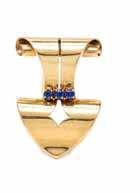 $2,500-3,500 205 A Retro Yellow Gold and Sapphire Cuf Bracelet, Forstner, featuring a lexible cuf surmounted with 11 oval mixed cut and cushion cut sapphires measuring from approximately 4.77 x 4.