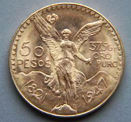 595 596 597 1917 Dutch 10 guilder gold coin, approx. 6.8 1924 Columbian gold coin, approx. 8.