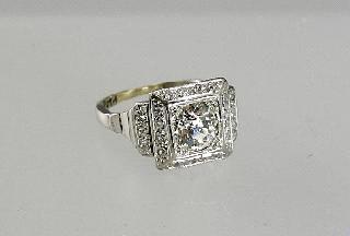 $1,500 - $2,000 425 14k white gold and 3 stone