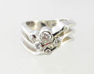 white gold and diamond heart shaped ring. 14k white gold bridal set with 0.42k diamond.