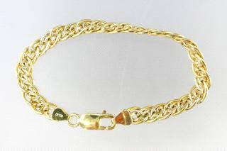 Lot # 497 497 Lot # 513 14kt. gold tri-colour bracelet. 513 Lady's 18kt. gold octagonal profile ring. $150 - $200 514 18kt. gold and large pierced jadeite ring. 14kt. gold tie tack.