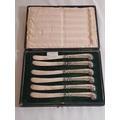 gold locket 151. Cased set of HM silver butter knives 144. Box of loose coins 152.
