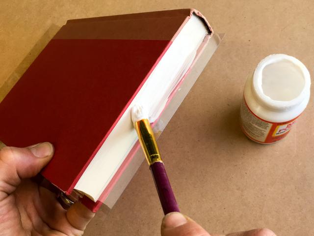There's no need to put glue in between each page -- the glue will soak in