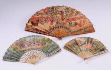 422 A late 18/early 19th century fan the printed paper leaf decorated on both sides with young lovers seated in gardens, having bone sticks