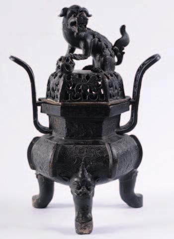 443 A Chinese bronze censer and cover, in the late 18th / early 19th century style, the temple