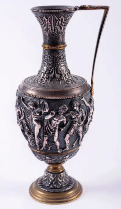 142 472 A 19th Century Continental cast metal ewer of classical outline, decorated with