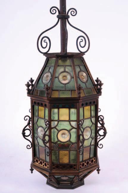473 A 19th century brass octagonal hall lantern in the Moorish taste, with leaded glazed
