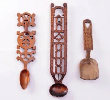 300-400 413 414 A Welsh treen love spoon, with ovoid shaped bowl, having and incised chairshaped ladder back,