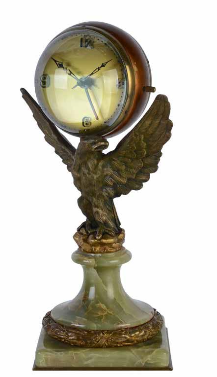 Lot 287 French Art Deco bronze eagle and marble based clock, with spherical clock to