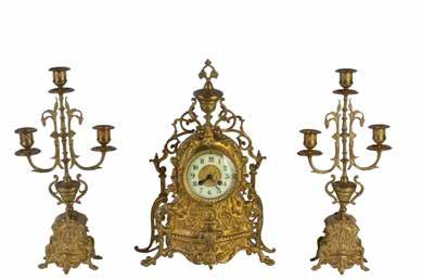 Lot 293 French brass three piece clock and