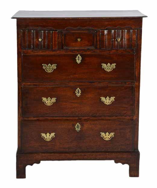 Lot 743 George III oak chest of drawers,