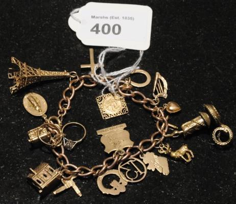 400. 9ct. Gold Charm Bracelet.
