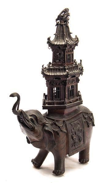 * 200-300 618 A large Japanese bronze caparisoned elephant incense burner with detachable