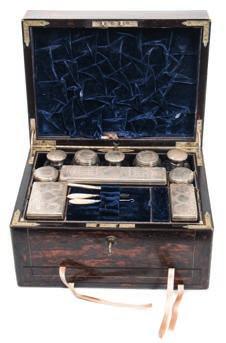 685 685 A 19th century coromandel and brass strung vanity case of rectangular outline, the hinged lid enclosing a