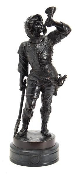 * 200-250 707 707 An early 20th century bronze figure of a Renaissance soldier blowing a