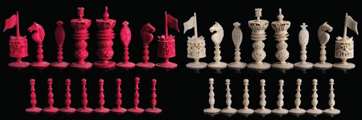 584 584 A late 19th century Macau ivory Burmese pattern chess set one side stained red, the