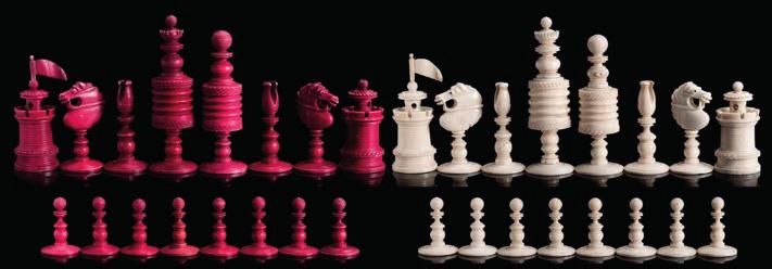 * 250-300 588 588 A 19th century ivory Calvert pattern chess set one side stained red, the other side left natural, The
