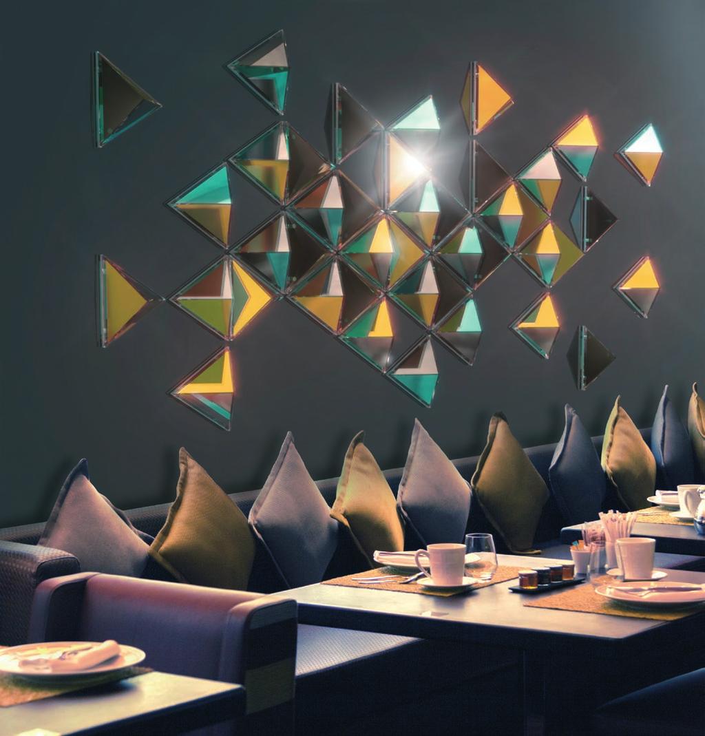 The pyramids in metallic colours become a dominating feature and a spectacular mirror of the entire