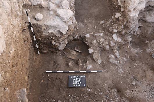 The complete clearing of the system could provide additional answers regarding the date. Silver and Gold Fig. 4, Jar burial under a wall. Fig. 6 The most interesting finds of the seven-year dig came this summer in Area C.