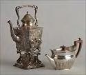 Lot #338: Victorian Silver Teapot London, 1889, maker's mark of Walter & John Barnard.