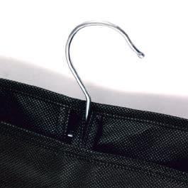 Suit cover, made with different materials, zipper, a hole to insert the hanger and the possibility to fold the cover introducing the hanger in the eyelet.