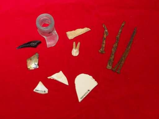 There was quite a bit of bone recovered from the yard, including avian and mammal (particularly pig teeth) as well as a large amount of oyster shells and burned coal, suggesting that individuals and