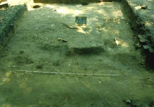 Figure 5-17: Photograph Unit 21 Mid-Excavation, Levels L, M, and O The northernmost three feet of the unit that was not disturbed cellar fill was already down to a culturally undisturbed yellowish