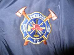 Job Shirt solid dark blue, collared, ¼ zip, maltese cross and crossed axes, upper left breast, no logo on back.