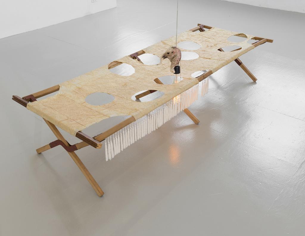 Jeffrey Joyal Jeffrey Joyal Leaky Tom 2016 found cot, latex, cotton, taxidermy turkey head, light bulb, electrical components Overall dimensions: 16 x 77 1/2 x 30 inches 40.