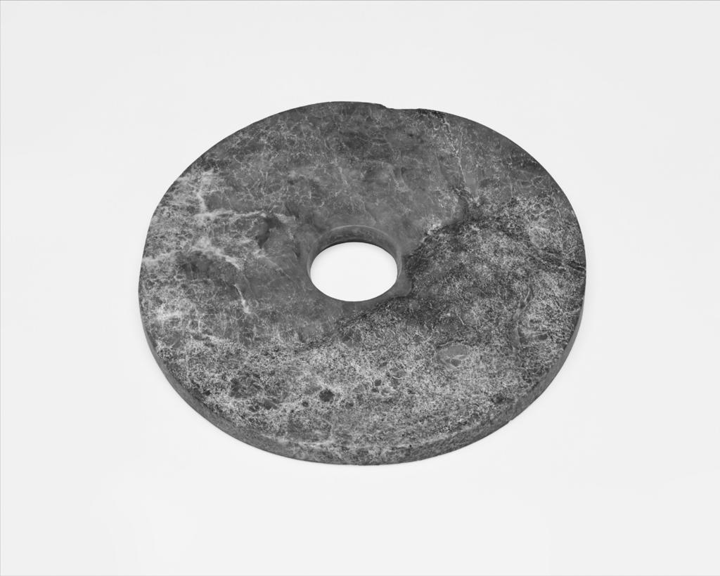 lopes. securing the harmony between the high and the low 199 Fig. 2. Bi disc, a ritual jade object from Liangzhu culture (c. 3200 2000 b.c.). Diameter: 21.3 cm. Source: Accession Number 1986.